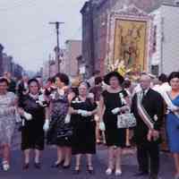 Color photo of Dominic Pescatore & group of women outside St. Joseph