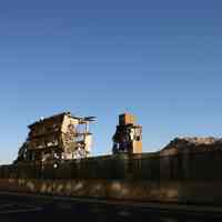 Twelve digital color images of the Maxwell House Coffee plant site, demolition of manufacturing building, Hoboken, October 2004.