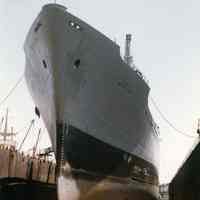 Color photo of U.S.N.S. Northern Light in drydock, Hoboken Shipyards, Hoboken, April 1982.