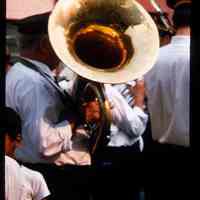 Color slide of a man playing a tuba.