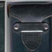          partial view of case (sheath); detail of flag closure with patent number
   