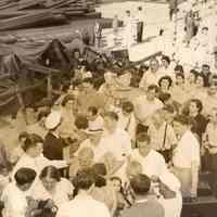 Digital image of sepia-tone photo of Fred DeSapio and people boarding a dayliner for DeSapio Democratic Assn. outing, Hoboken, no date, ca. 1945-1947.