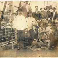 Sepia-tone photo of Kirchgessner family members et al on deck S.S. Konprinz Wilhelm in Hoboken, n.d., 1910-1914.