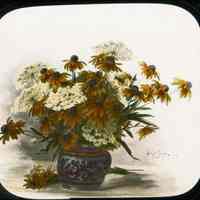 Lantern slide, color, of a centerpiece of black-eye susan & wild carrots, used for promotional display in Hoboken, no date, ca. 1920.