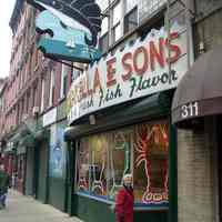          Sign on building Jan. 2006; view southeast
   