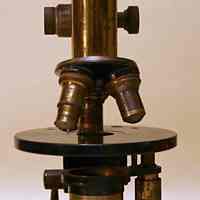 Microscope from science classroom of Stevens - Hoboken Academy, Hoboken, in use circa 1920-1975.