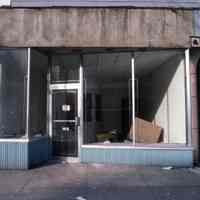 Color slide of a vacant storefront at 326 Washington St., Hoboken, December, 1983.