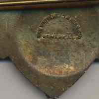          detail back, maker's mark
   