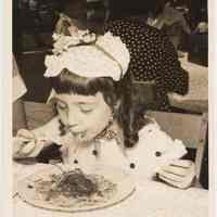          Photo 2, image: Cheryl Petrignani eating spaghetti
   