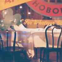 Color print "Night Photography of Hoboken; Through the Storefront." Photograph taken by Donna Clovis, no date, ca. 2002.