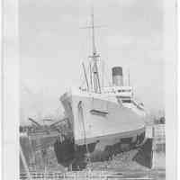 B+W photo of hull painting of the S.S. Pastores in dry dock, Hoboken, no date, ca. 1940.