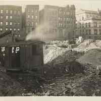 Sepia-tone photo of foundation preparation on the site for the Fabian Theatre, southeast corner of Newark & Washington Sts., Hoboken, Nov. 19, 1927.