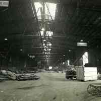 Digital image of black-and-white photo of the interior of the Pier 16 shed, Hoboken Dock Company, Hoboken, no date, ca. 1945-51.