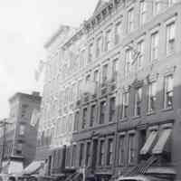 Black-and-white digital print of photo of buildings on east side of Madison Street, 200 block, Hoboken, 1943.