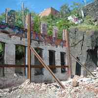 Color photos, 17, of Paterson Plank Rd. building exterior walls reinforced for re-use in new building, Jersey City, May 20, 2006.