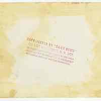          02-3 back of photo 1 with Daily News inkstamp
   