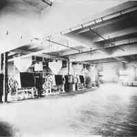 Sepia-tone photo of the mixing room of John Schmalz