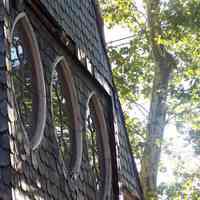          48: detail of second story window parish house, Sixth St. facade
   