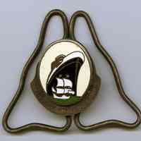 Holland America Line crew uniform hat badge. No date, circa 1938-1953.