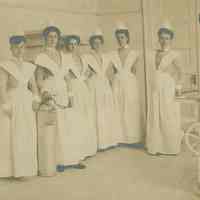 Sepia-tone 5" x 7" group photo of nurses at St. Mary Hospital, Hoboken, N.J., no date, ca. 1910-1920.