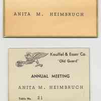          place card; name tag
   