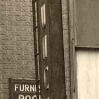          detail center:  former Hoboken Lunch hanging sign
   
