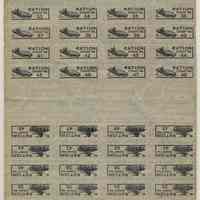          typical full sheets of coupons or stamps; boat or tank motif
   