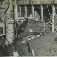 B+W photo showing damage on the main deck on unidentified vessel at the Bethlehem Steel Shipyard, Hoboken Division, no date, ca. 19