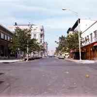 Color photo of a view from River Street up Newark Street with the Clam Broth House at the right, Hoboken, no date, ca. 1975.