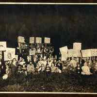 Sepia-tone photo of students in costume for a lacrosse(?) team rally in Elysian Park, Hoboken, 1914.