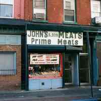 Color photo of sign for John