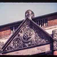          Color slide of close-up view of pediment reading 