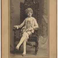 Sepia-tone photo of Sternafeldt girl dressed in French costume, Hoboken, n.d., ca. 1900-1920.