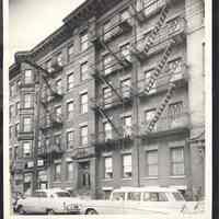 B&W photo of mixed-use apartment building at 921 Clinton Street, Hoboken.