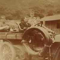Digital image of photo of four men in an automobile, no place, no date, circa 1910-1915.