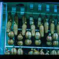 Color slide of Italian cheese in a window.