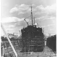 B+W photo of a straight-on bow view of the S.S. Gulf Oil in dry dock, Hoboken, June, 1940.