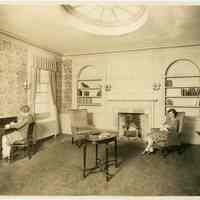 Sepia-tone photo of the interior of a women