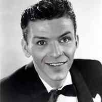 Black-and-white publicity photo of a young Frank Sinatra in a black dinner jacket & bowtie, no place, no date, probably Dec., 1942