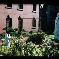 Color slide of statues in a garden.