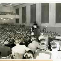 Sinatra photo: Frank Sinatra addressing 2300 boys at Benjamin Franklin H.S., N.Y., about racial prejudice, Oct. 23, 1945.