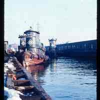 Color slide of three tug boats at a dock.