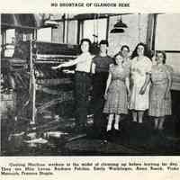          detail pg 2, photo with caption: Coating Machine workers....
   