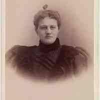 Cabinet photo of middle-aged woman posed in photographer