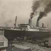 Sepia-tone photos, 3, of S.S. Leviathan departing from Pier 4, Hoboken, Jan. 25, 1938.