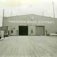 Digital image of black-and-white photo of the pier end of Pier 16 shed, Hoboken Dock Company, Hoboken, no date, ca. 1945-51.