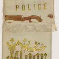 Ribbon from ribbon badge: Hoboken Police, Floor. No place, no date, circa 1900-1915.