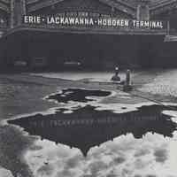 Reference image of printed photo image of Erie-Lackawanna Hoboken Terminal exterior from pg 30 of archives catalog 2002.026.0002, Hoboken, ca. 1975.