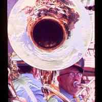 Color slide of a man playing a sousaphone.