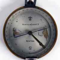          top view of compass with sights open
   
